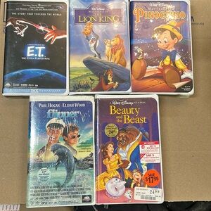 1990’s Disney VHS movies E.T.,Lion King, Pinocchio,Flipper,Beauty, and the Beast